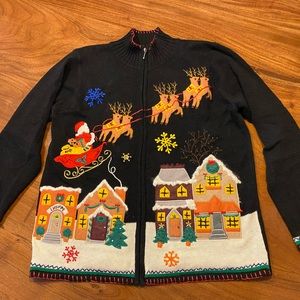 Women’s Christmas sweater by ARRIVISTE. Size medium.